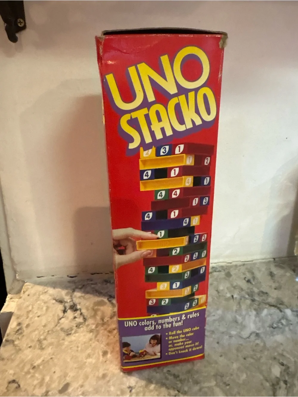 Mattel UNO Stacko Red Game Box with Yellow and Blue Elements